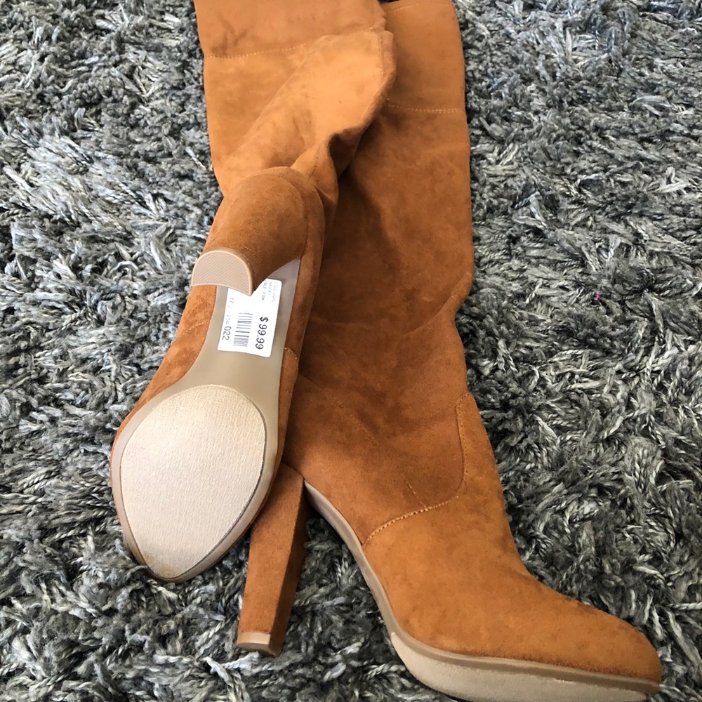 Camel trendy fall over the knee boots.